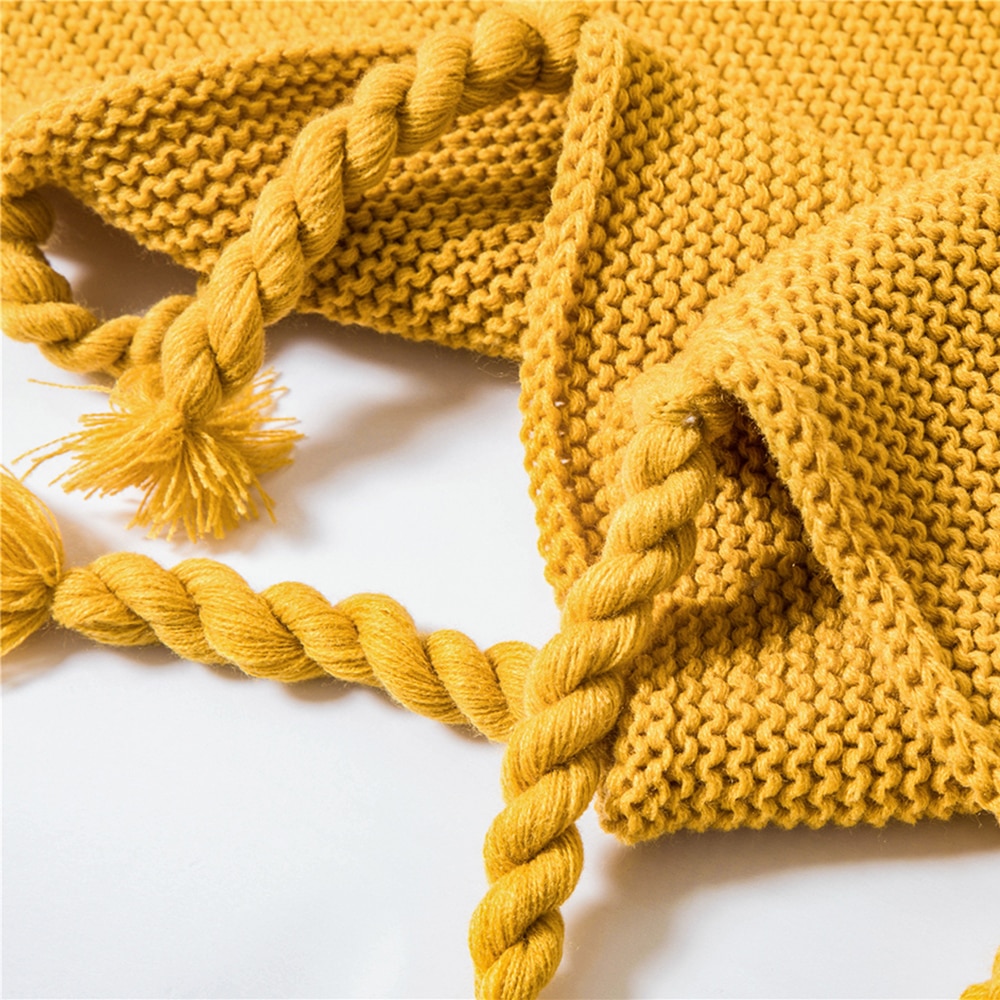 Plaid tricoté main à franges