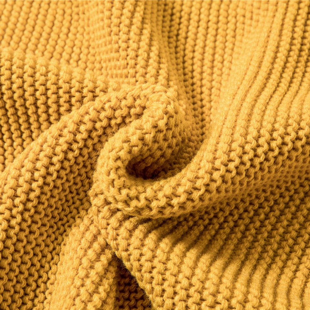 Plaid tricoté main à franges