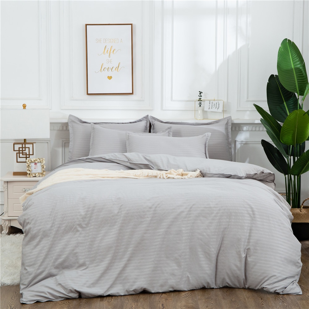 Parure de lit sobre avec housse de couette et taies d'oreiller