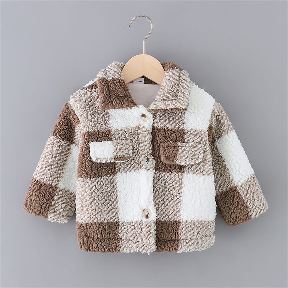 photo d'un manteau en lainage à carreaux beige et marron pour bébé