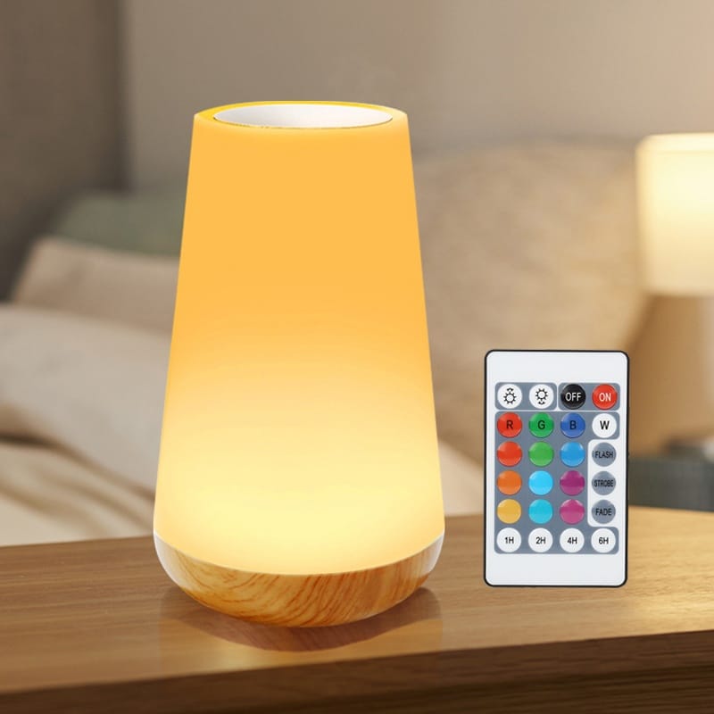 Photo d'une lampe de chevet avec une télécommande pour changer la couleur
