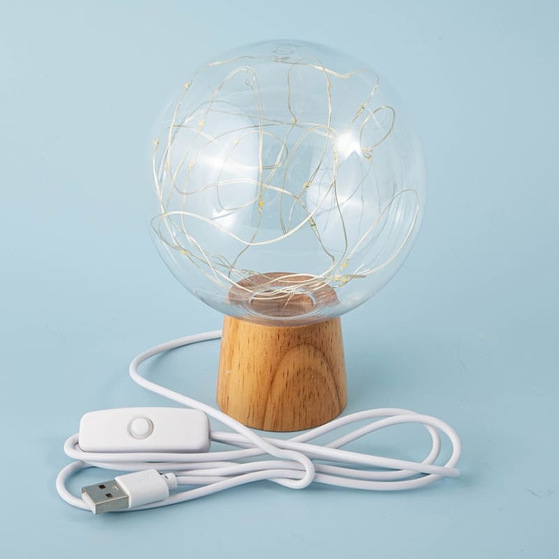 Lampe cocooning boule de cristal et guirlande LED